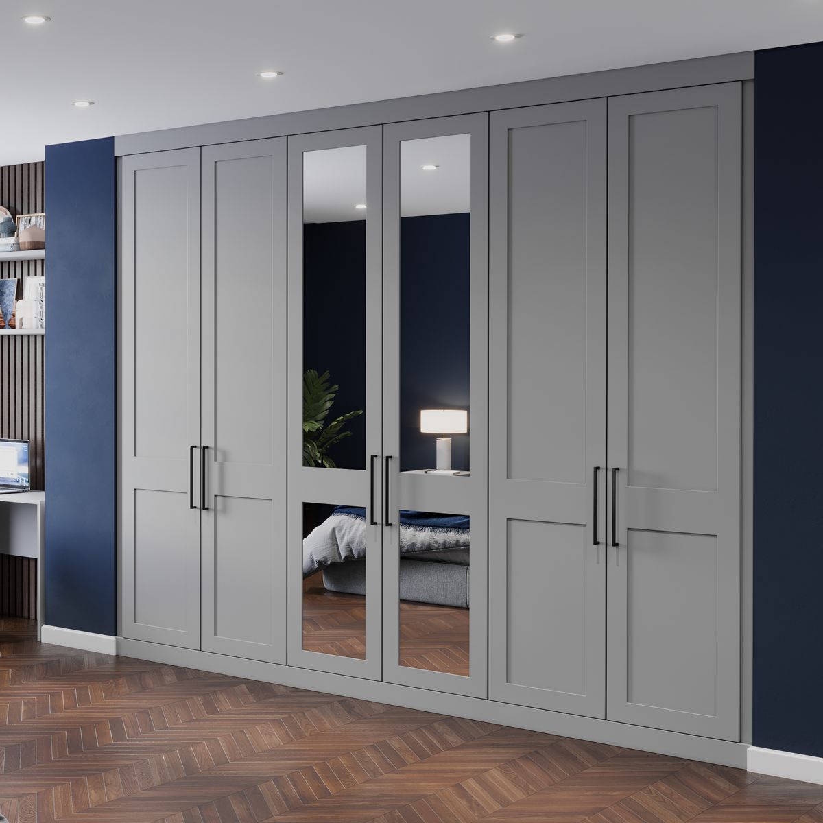 Modern bedroom with gray wardrobe, bed, and desk.