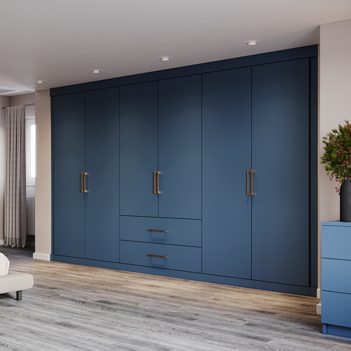 Modern bedroom with blue wardrobe and white bed