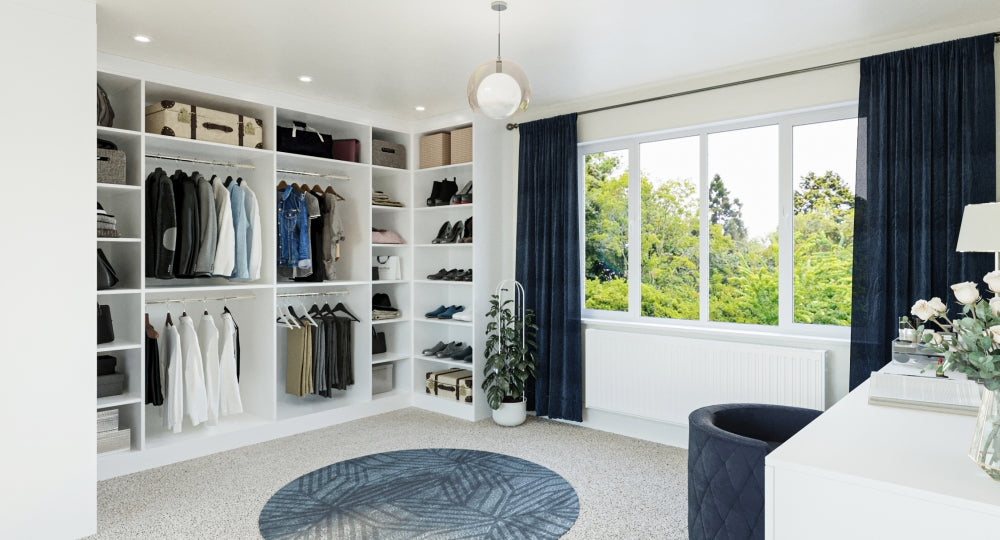 Bedroom with walk in wardrobe with shoes and clothes inside