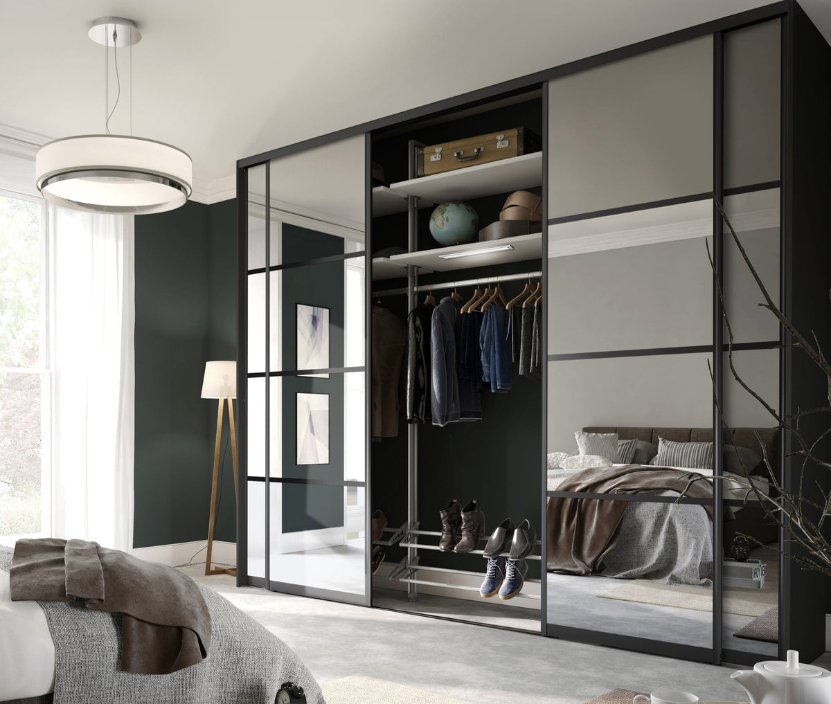 Modern bedroom with a large mirrored wardrobe and bed.