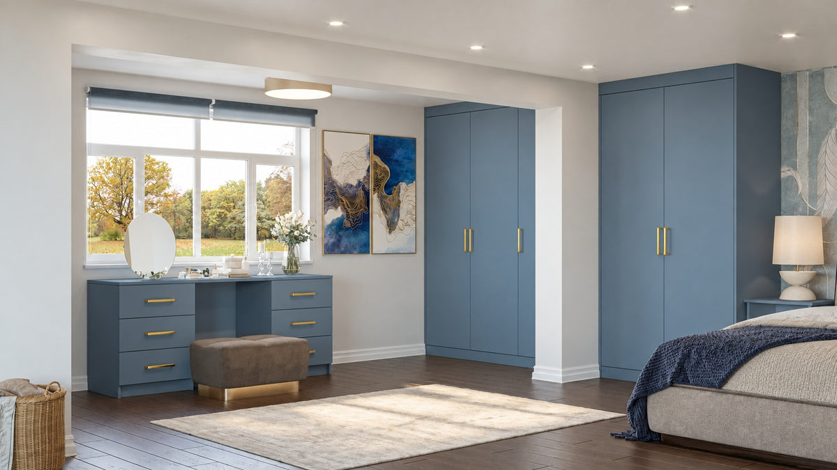 Harbour Blue fitted bedroom with six-drawer dressing table and upholstered vanity stool